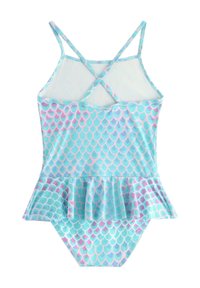Maillot de bain une pièce avec bretelles croisées ajustables, affichant une base bleue et un motif écaille de poisson rose et violet en forme de vague, avec un ourlet à volants.