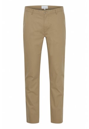 Smėliniai medvilniniai chino tipo kelnių su siauru kirpimu, su priekiniais mygtukais, diržo kilpomis ir dviem šoninėmis kišenėmis. Lygus paviršius ir pritaikytas dizainas.