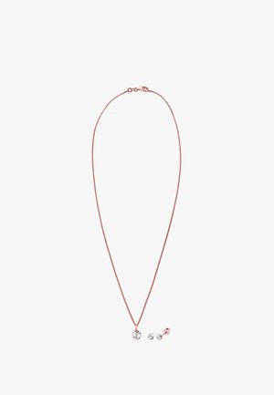 Naszyjnik w kolorze różowego złota z delikatnym łańcuszkiem, z centralnym wisiorkiem z przezroczystego kryształu oraz pasującymi kolczykami na sztyfcie. Prosty, elegancki design.