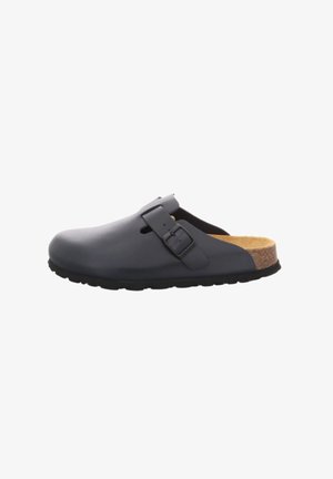 Black slip-on clog with adjustable side buckle, cork footbed, and textured black sole designed for comfort and casual wear.
