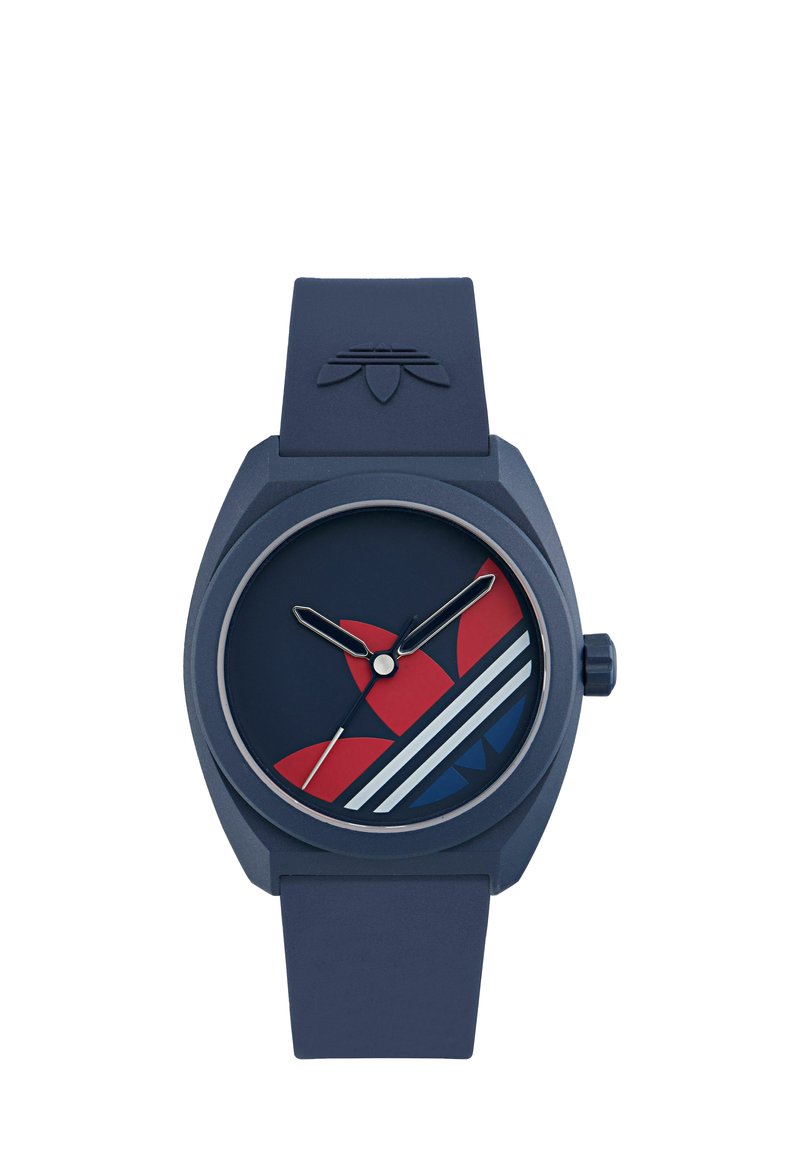 Navy blue wristwatch with silicone strap, featuring red and blue floral design and white diagonal stripes on the round face.