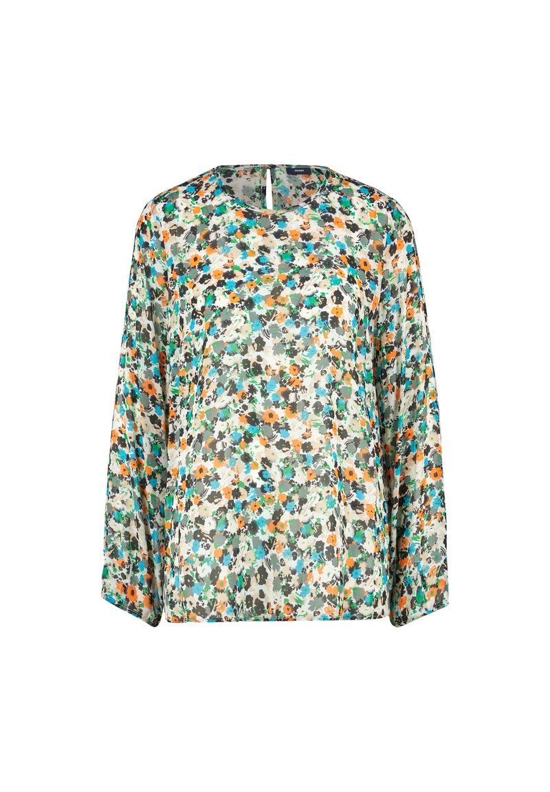Blusa floral hecha de un tejido ligero y transparente; presenta un patrón multicolor con flores verdes, naranjas y azules sobre un fondo crema.