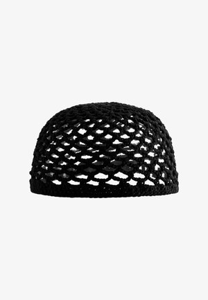 Black crocheted skullcap with open weave pattern, rounded shape, and visible knit texture, displayed against white background.