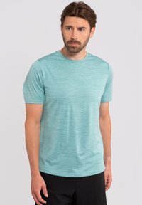Rukka YLIKIIKA - T-shirt de sport - grün