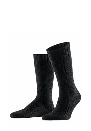 Schwarze Socken aus strukturiertem Strickstoff, mit einem gerippten Bündchen und verstärktem Zehen- und Fersenbereich für Langlebigkeit. Klassisches Knöchelsocken-Design.