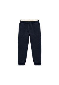 Pantalones de chándal azul marino hechos de un tejido texturizado, con cintura ajustable mediante cordón, banda elástica color crema y puños ajustados en los tobillos.