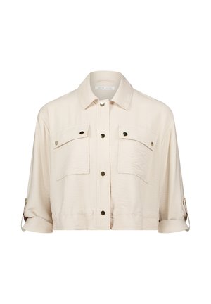 Licht beige cropped jack in een zachte stof, met een kraag, twee borstzakken, knopen in goudkleur en opgerolde mouwen.