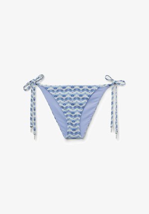 Blå og hvide mønstrede bikinitrusser med sidelukninger, der har et bølget geometrisk design og en ensfarvet lyseblå inderforing.