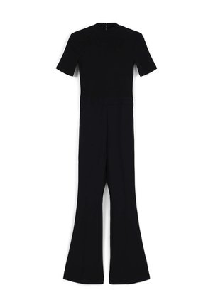 Tuta nera con maniche corte, corpetto aderente e pantaloni a zampa. Tessuto liscio con scollatura alta e zip sul retro.