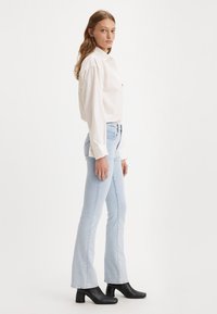 Levi's® 725™ HIGH RISE BOOTCUT - Jeans bootcut - what's my name