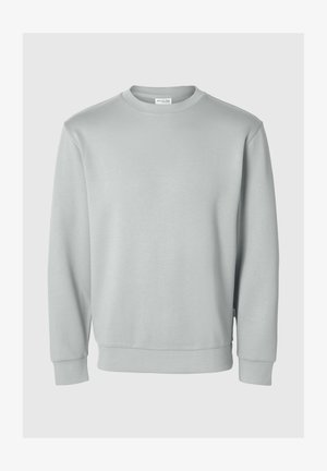 Sweatshirt cinza claro com decote redondo, mangas longas, punhos e barra canelados, feito de um tecido macio e suave. Sem logótipos visíveis.