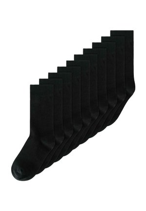 Tien paar effen zwarte kniekousen in overlappende opstelling op een witte achtergrond.