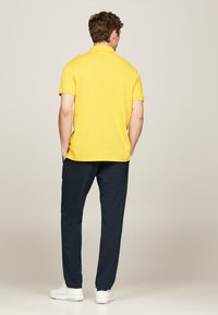 Tommy Hilfiger REGULAR - Poloshirt - primary yellow
