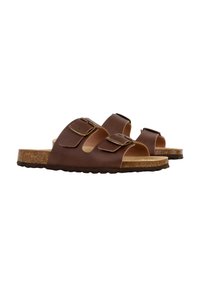 Sandales à glissière en cuir marron avec deux boucles réglables ; semelle en liège et semelle en caoutchouc ; design ouvert à l'avant. Texture lisse et style décontracté.