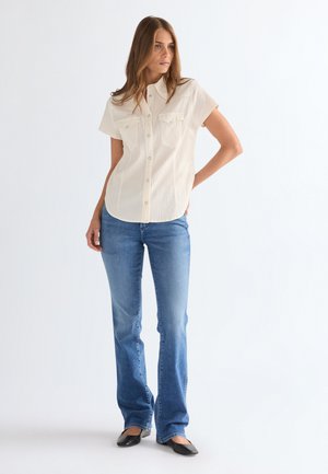 BOOTCUT - Bootcut piegriezuma džinsi - raven