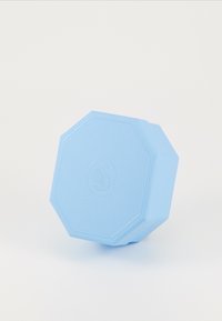 Blue rubber octagonal block with textured surface and a logo embossed on one side, designed for fitness or yoga activities.