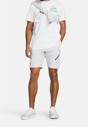 White T-shirt with an "Ice Cold" graphic, paired with light gray shorts featuring black zippers. Worn with light gray athletic shoes.
