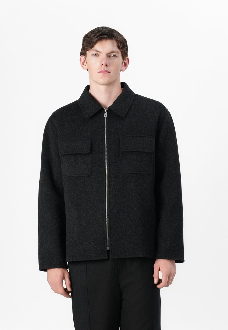 sandro Lichte jas donkerblauw