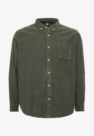 Green corduroy button-up shirt with long sleeves, a single chest pocket, beige buttons, and a rounded hem. Texture appears soft and durable.