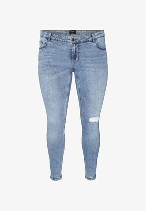 Jeans ajustados de mezclilla azul claro con un desgarro rasgado en el muslo derecho, diseño de cinco bolsillos y cierre de botón estándar.