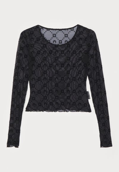 Črn top z dolgimi rokavi, izdelan iz prosojnega, teksturiranega materiala, z dvignjenim cvetličnim vzorcem in okroglim izrezom ter robom s čipkastim zaključkom.