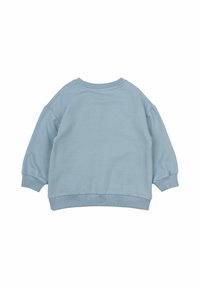 Svetlo modra dukserica z dolgimi raglan rokavi, okroglo ovratnikom in rebrastimi manšetami ter robom. Mehak material z gladko teksturo.