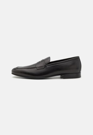 Stuart Weitzman Našuchovačky - black