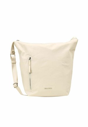 Sac bandoulière couleur crème avec une finition texturée, comportant une poche zippée, une bandoulière ajustable et un design minimaliste.