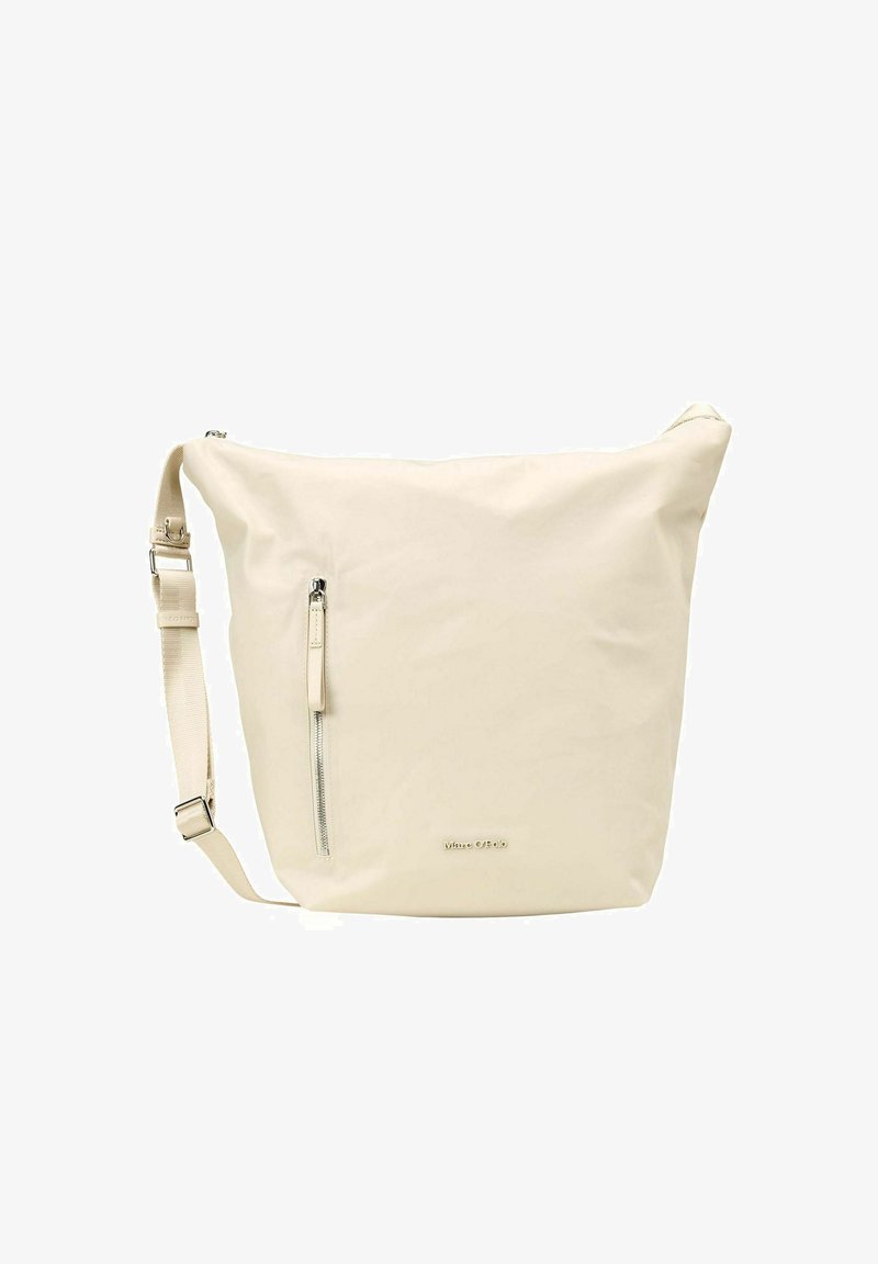 Sac bandoulière couleur crème avec une finition texturée, comportant une poche zippée, une bandoulière ajustable et un design minimaliste.