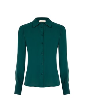 Blusa a maniche lunghe color turchese con colletto classico, chiusura con bottoni frontale e polsini arrotondati. Realizzata in un tessuto leggero e liscio, presenta un design semplice.