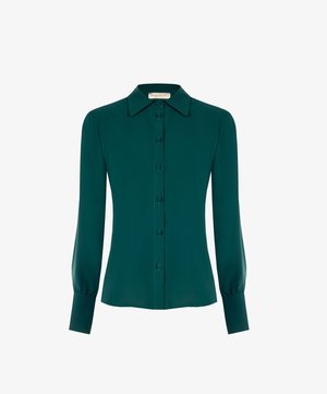 Blouse longue à manches teal avec un col classique, un devant à boutons et des poignets arrondis. Fabriquée en tissu lisse et léger, avec un design sobre.