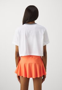 Nike Performance HERITAGE CROP TEE - Camiseta deportiva - white