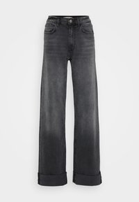 Jeans neri a gamba larga con vita alta, dotati di tasche e chiusura con bottone. Il tessuto ha una consistenza morbida e leggermente sbiadita.