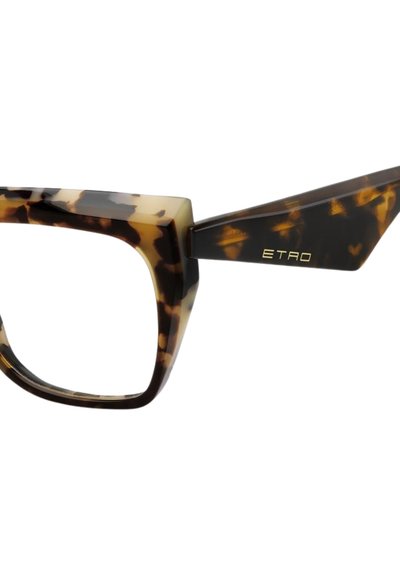 Gli occhiali tartarugati presentano una montatura spessa e quadrata con astine angolari e affilate. Il logo "Etro" in oro è esposto sull'asta.