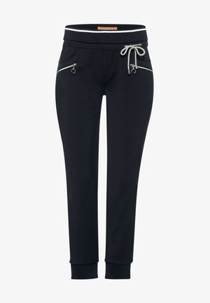 Czarne spodnie dresowe z białym sznurkiem, białym paskiem w talii z paskami, przednimi kieszeniami na zamki i ściągaczami przy kostkach.