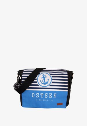 Canvas messenger bag with black trim, blue and white striped design, circular anchor logo, and "OSTSEE ORIGINAL" text. Adjustable strap included.