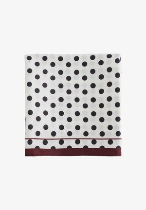 Bijeli šal s uzorkom crnih točkica. S donje strane ima bordo obrub. Glatka tekstura, četvrtasti oblik.