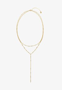 Seleccionado, gold coloured