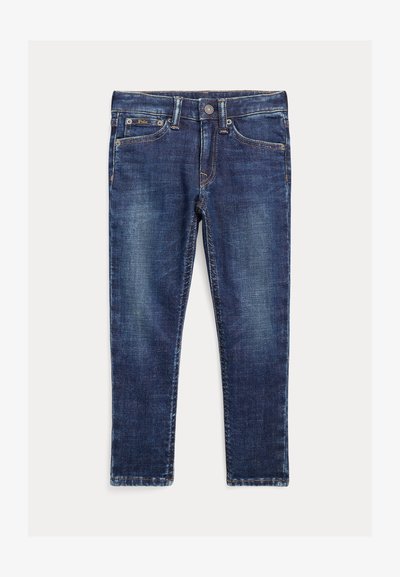 Tumši zili džinsi ar klasisku taisno kāju dizainu, kuriem ir piecas kabatas un smalka izbalējuma ietekme. Iekļauts metāla pogas aksesuārs.