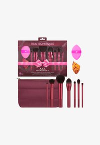Set di pennelli per il trucco Real Techniques in edizione limitata composto da 10 pezzi, con spugne rosa e arancioni e una pochette bordeaux.