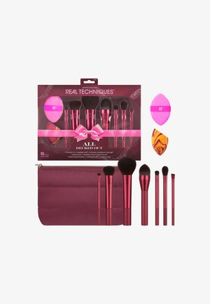 Beperkte oplage 10-delige Real Techniques make-up penseelset met roze en oranje sponsen en een bordeauxrode draagtas.