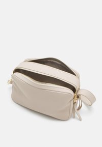 Coccinelle MALORY - Borsa a tracolla - white