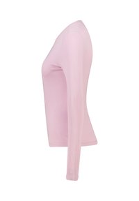 Long-sleeve fitted top in light pink ribbed fabric. Features a round neckline and seamless cuffs. Smooth texture with subtle stretch.