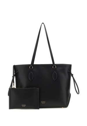 Sort læder tote bag med to lange hanke, der har en lynlåspung. Glat tekstur, minimalistisk design, guld logo accenter på begge genstande.