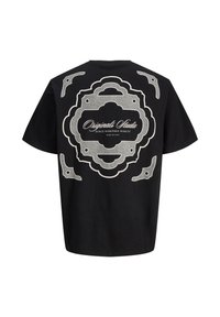 Μαύρο T-shirt με κοντά μανίκια με λευκό περίπλοκο γεωμετρικό μοτίβο και κείμενο "Originals Studio Since Nineteen Ninety Made to Last" στην πλάτη.