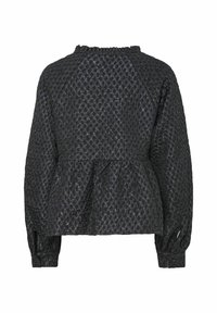 Haut péplum noir en tissu texturé, doté d'un col smocké, de manches longues et de fronces autour de la taille.