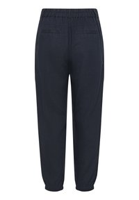 Pantaloni navy blue con vita elastica e taglio affusolato, dotati di due tasche posteriori e polsini arricciati per uno stile rilassato. Tessuto morbido e testurizzato.
