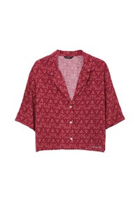 Blusa rossa a maniche corte con un motivo floreale in crema. Presenta una chiusura con bottoni nella parte anteriore e un collo per un fit rilassato.