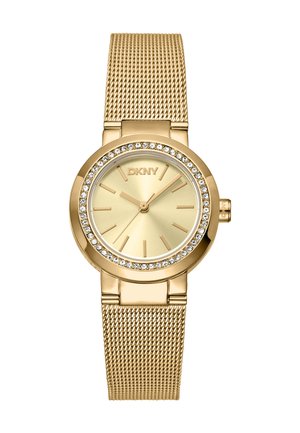 Gold mesh strap watch with a circular case, gold-toned dial, and crystal accents around the bezel. Simple hour markers and hands.