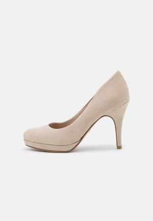 Plateaupumps - ivory
